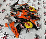 Fairing Kit for a Kawasaki Ninja ZX10R (2011-2015) Orange, Black, Red, Yellow RedBull at KingsMotorcycleFairings.com