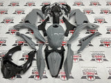 Fairing kit for a Kawasaki Ninja 400 (2018-2023) Nardo Gray & Faux Carbon Fiber at KingsMotorcycleFairings.com.