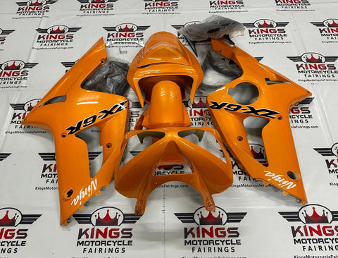 Fairing kit for a Kawasaki ZX6R 636 (2003-2004) Orange, Black & White at KingsMotorcycleFairings.com