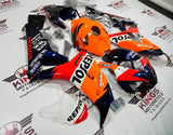 Honda CBR1000RR (2006-2007) Orange, Dark Blue, Red, White REPSOL Fairings at KingsMotorcycleFairings.com.